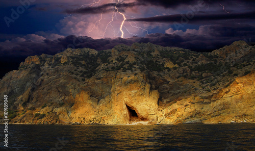 On The Cliffs Of The Kara Dagh/Storm and lightning. Crimea, a mountain massif Karadag. near Koktebel. Shore Of The Black Sea photo