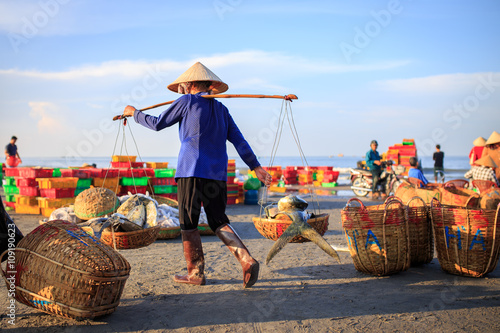 LONG HAI, VIET NAM - MAY 31 2015: Unidentified People working at