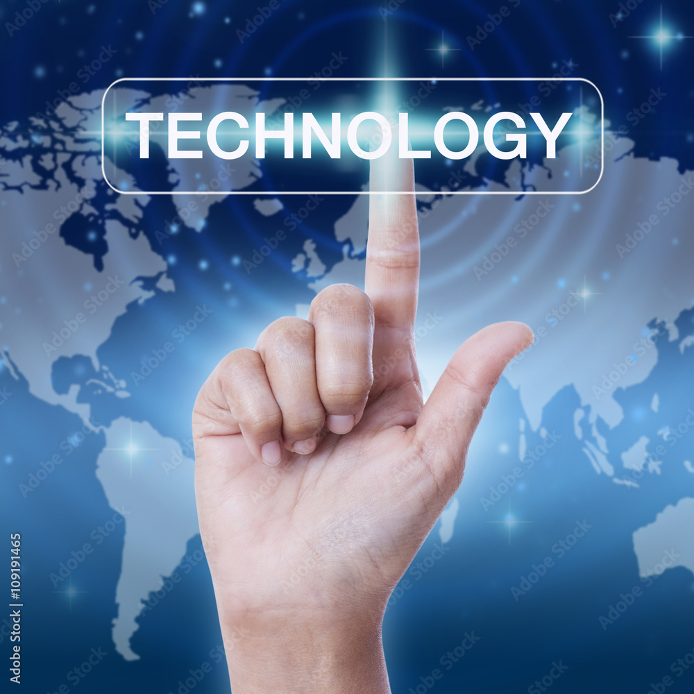 hand pressing technology word button. hand pressing technology word button.