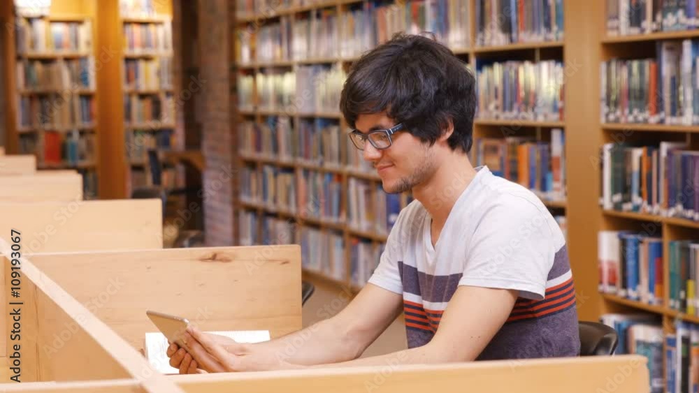Handsome student using tablet Handsome student using tablet