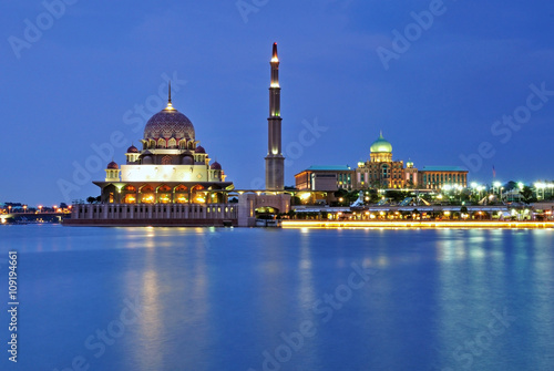 Putra mosque and Malaysia federal building during blue hour.