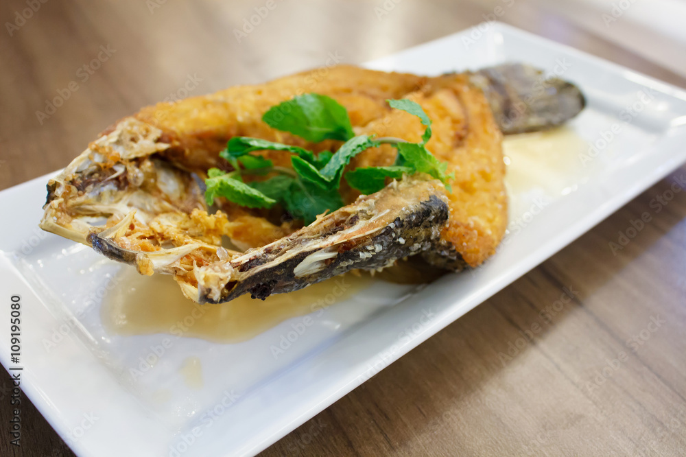 Deep fried sea bass with fish sauce, Thai Food Deep fried sea bass with fish sauce, Thai Food