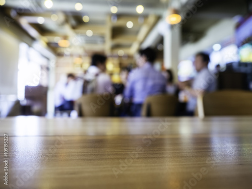 Table top Counter with Blurred People and Restaurant Shop interior © VTT Studio