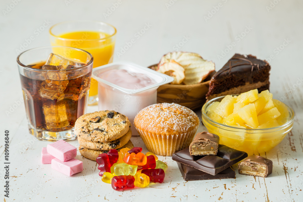 Selection of food high in sugar - obrazy, fototapety, plakaty 