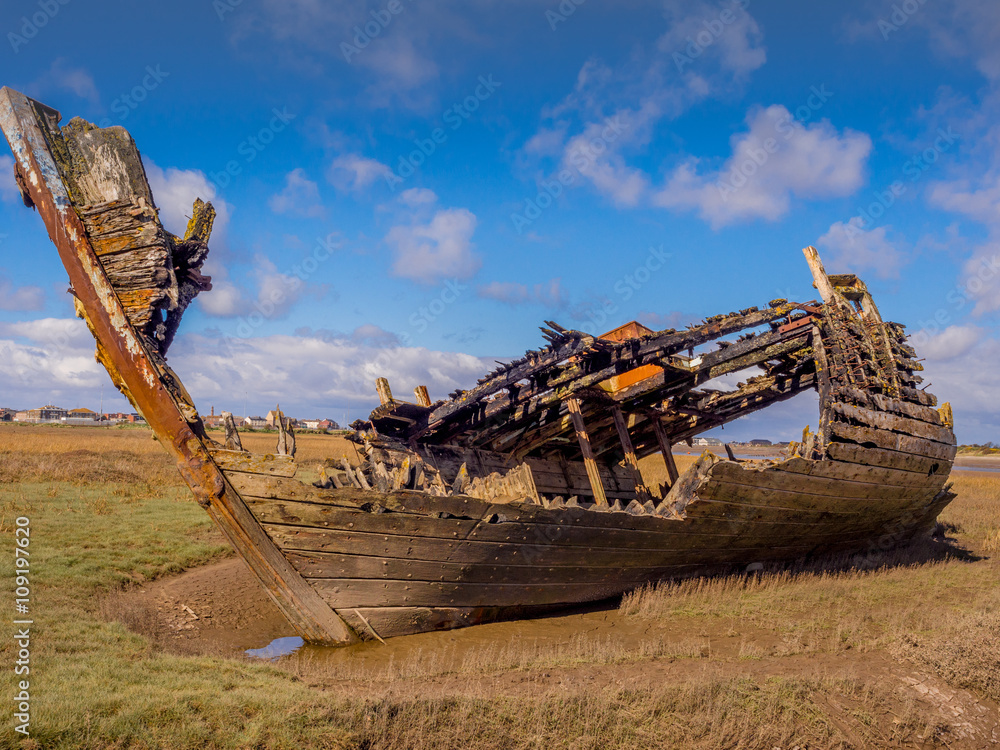 Old wooden and metal boats at Fleetwood Boat Graveyard, Fleetwood, Lancashire, UK