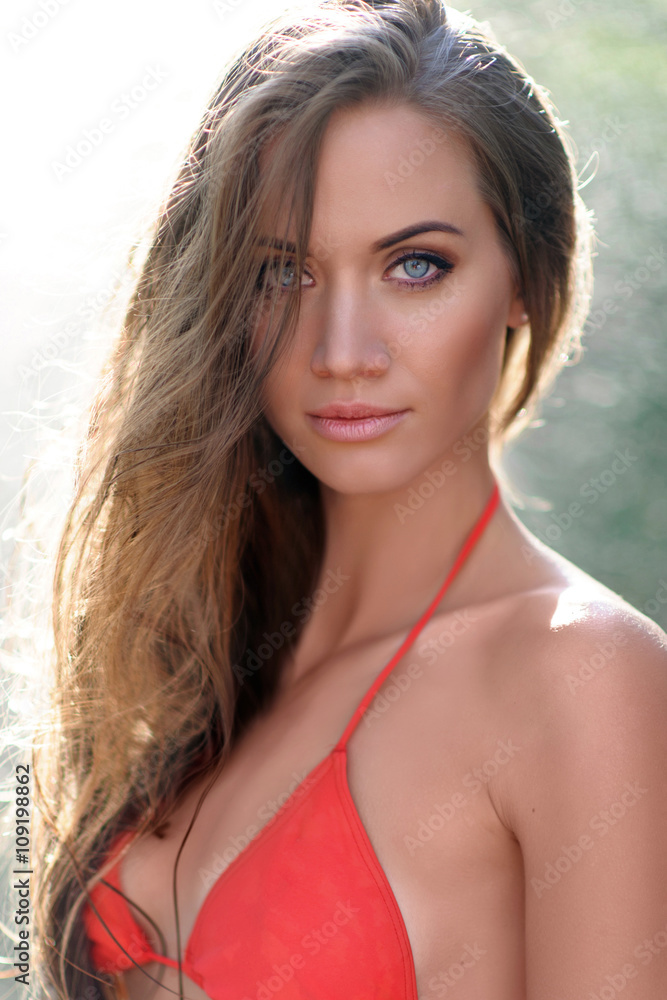 portrait of a beautiful sexy woman on the beach