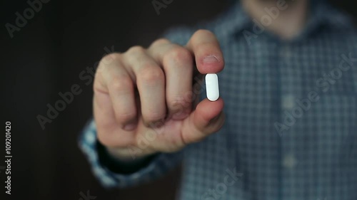 Man Offering Patient a Pill, Medical Prescription for Treatment