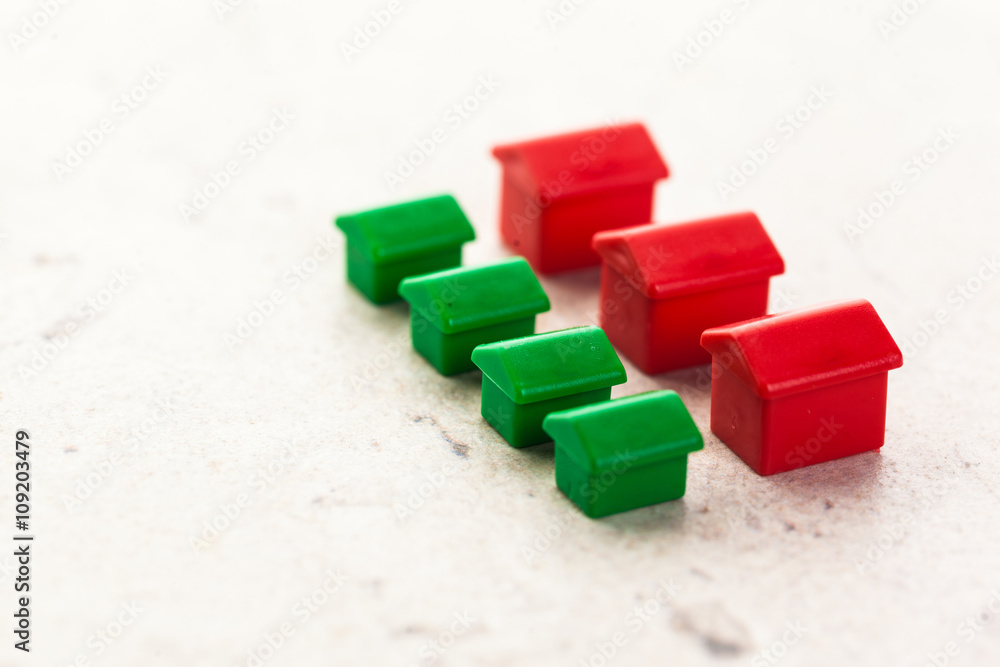 Macro shot of miniature plastic houses Macro shot of miniature plastic houses