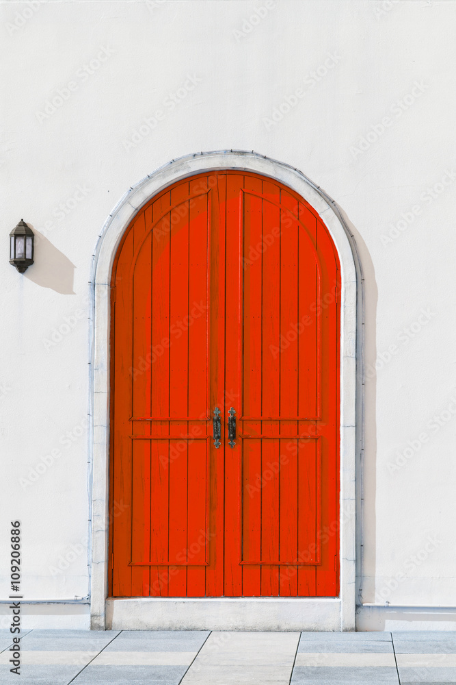 Colorful wooden red door and Detail of house exterior