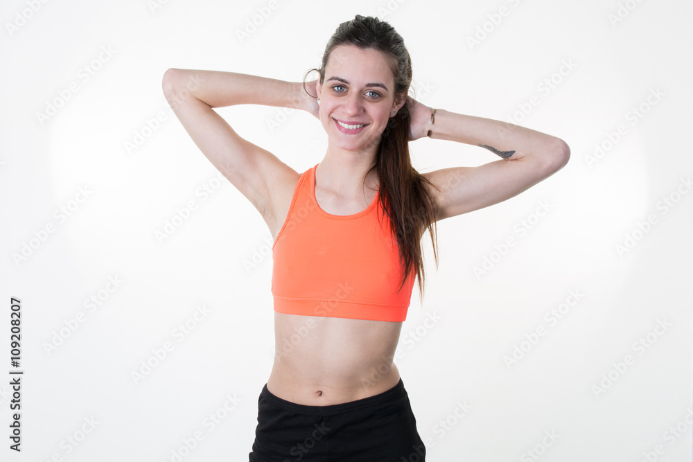 Gorgeous woman in a sports wear isolated on white background Gorgeous woman in a sports wear isolated on white background