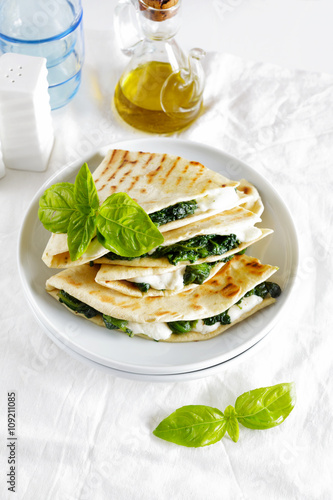 piadina with spinach and mozzarella. Italian healthy snack. stre