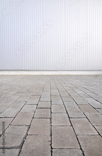 Sheet metal, corrugated wall building