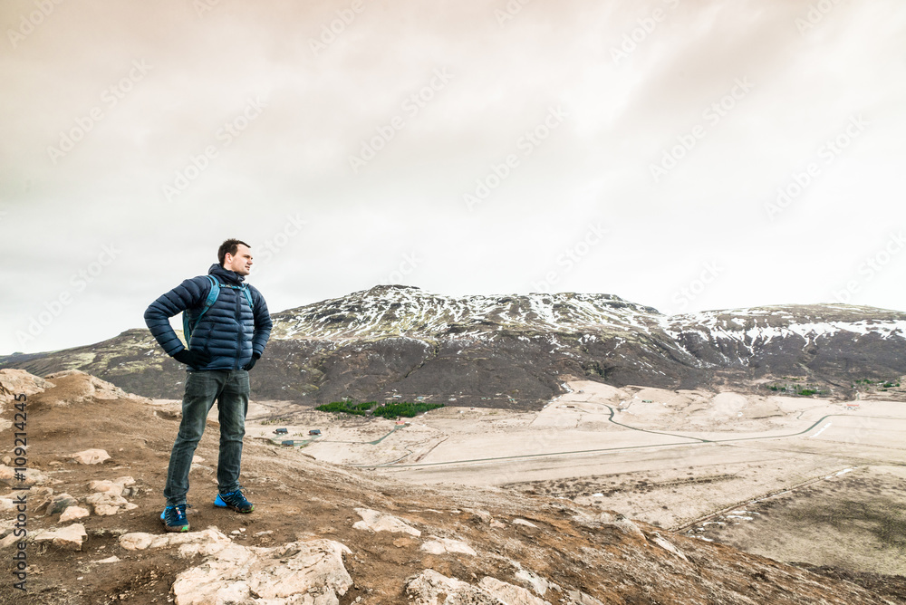 Hiking man on a mountain in Iceland