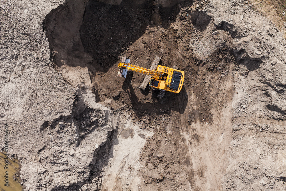 Aerial view of the working earth mover Aerial view of the working earth mover