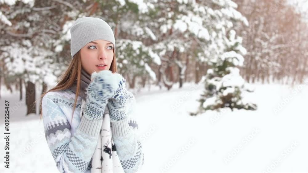 Girl drink coffee outdoors in winter forest Girl drink coffee outdoors in winter forest