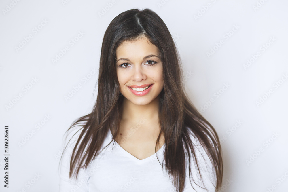 Beautiful woman smiling. Young Female touching Her Skin. Portrait on White Background. Perfect Skin. Beauty Face. Beautiful woman smiling. Young Female touching Her Skin. Portrait on White Background. Perfect Skin. Beauty Face.