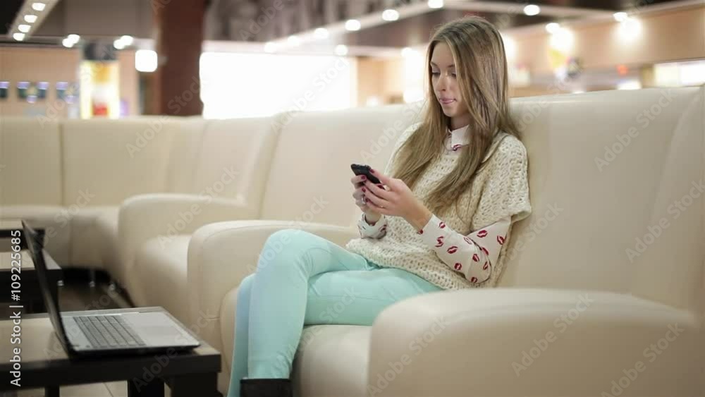 Girl sends selfie via sms from waiting room Girl sends selfie via sms from waiting room