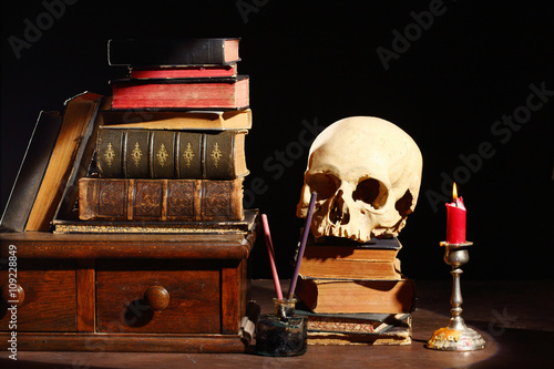 books and skull