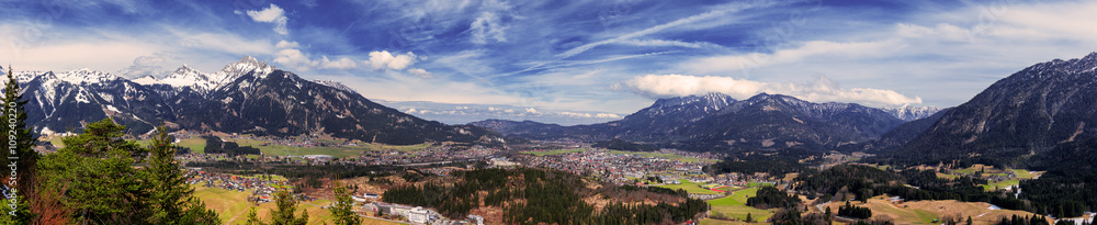 Panoramic view of Reutte city with Alps and clouds, high resolution image. Alps, Tyrol, Austria.