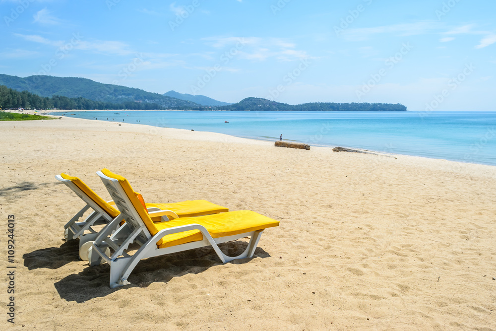 Beach chairs on the Beach with blue sky in Phuket,Thailand Beach chairs on the Beach with blue sky in Phuket,Thailand