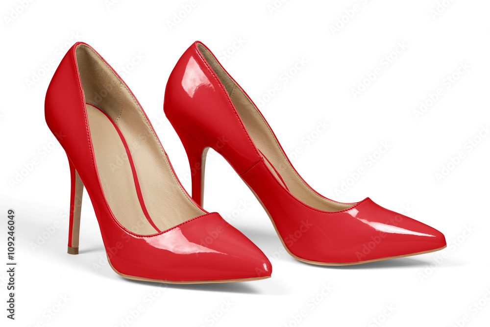 A pair of red high heel shoes isolated on white with clipping path. A pair of red high heel shoes isolated on white with clipping path.