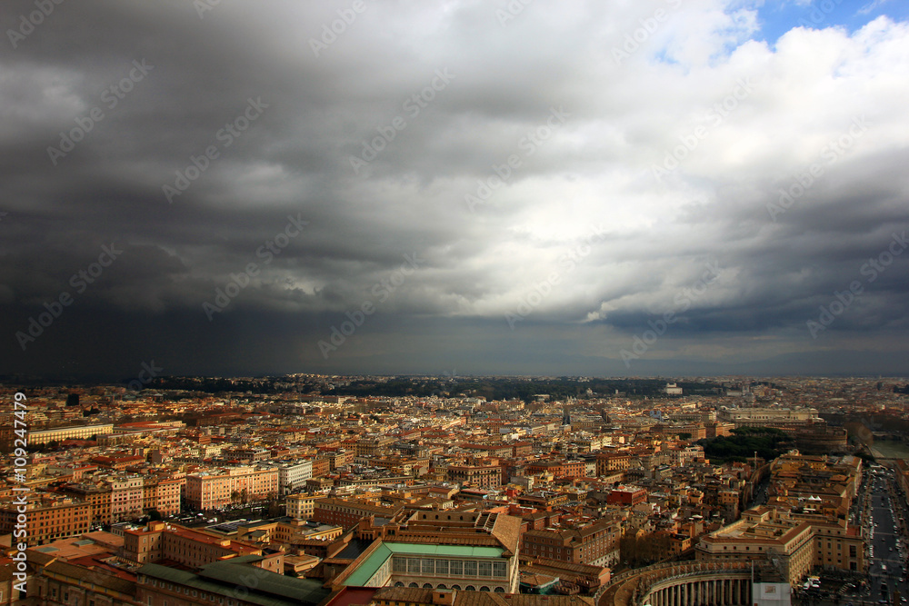 Obraz premium view of Rome from the dome of St Peter's Basilica during a thund