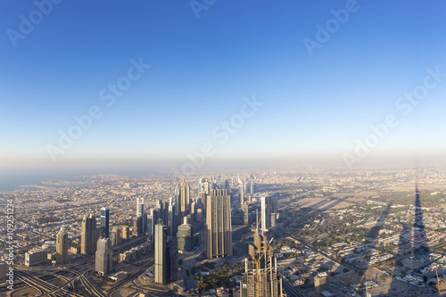 Aerial view of downtown in Dubai with blue sky