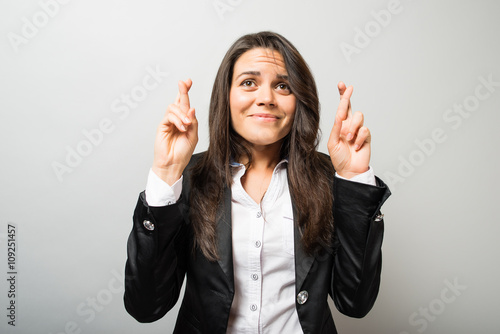 girl crossed her fingers for luck