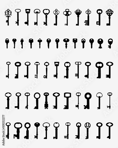 Set of black silhouettes of door keys, vector