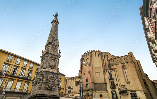 Church of San Domenico Maggiore and statue of Saint Dominic in Piazza San Domenico Maggiore,on Spaccanapoli,one of the main streets of the original Greek city of Neapolis photo