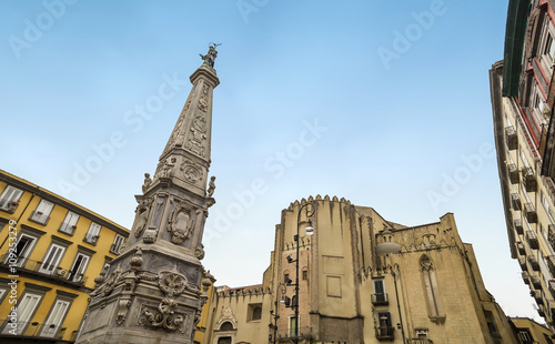 Church of San Domenico Maggiore and statue of Saint Dominic in Piazza San Domenico Maggiore,on Spaccanapoli,one of the main streets of the original Greek city of Neapolis photo