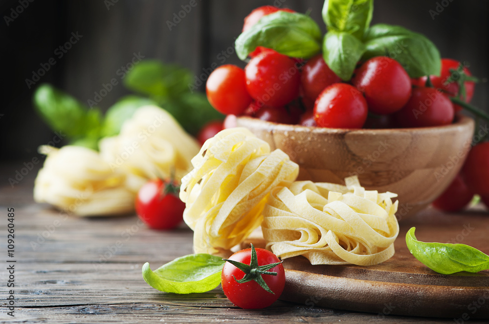 Concept of italian food with pasta and tomato Concept of italian food with pasta and tomato