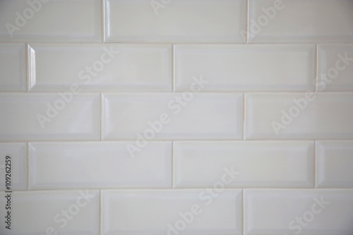white tiled wall © sociopat_empat