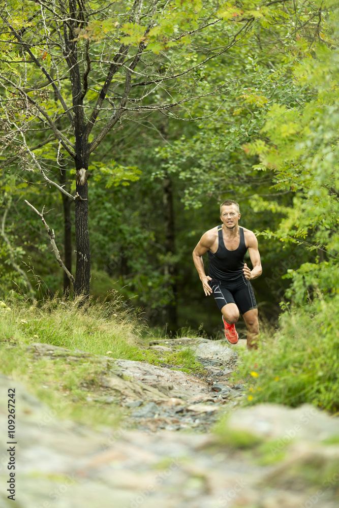 Man running in forest Man running in forest