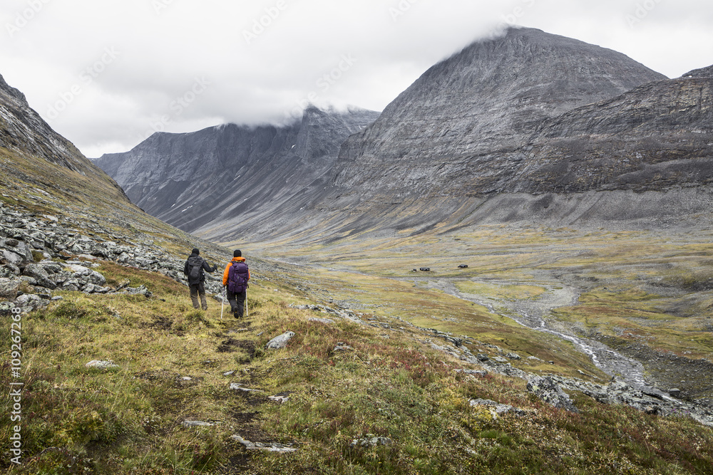 Hikers in mountains Hikers in mountains