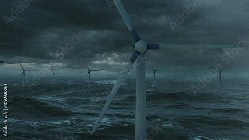 Wind turbines in the stormy sea. (Loop)