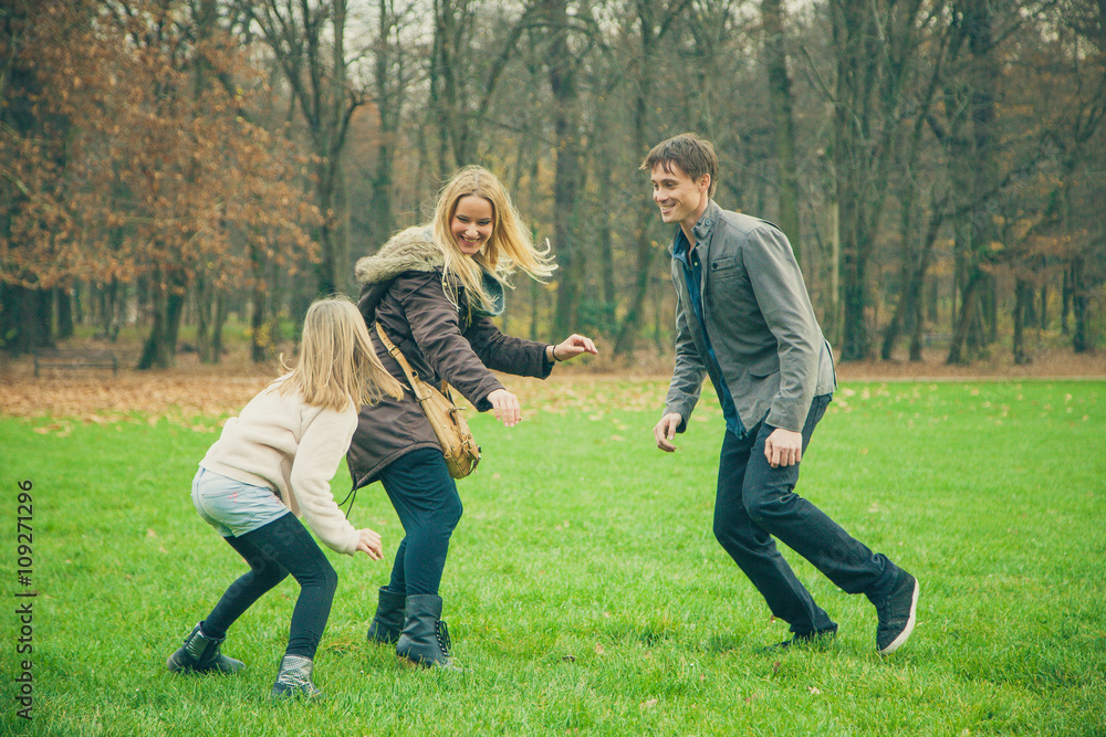 Fototapeta premium Family of three playing