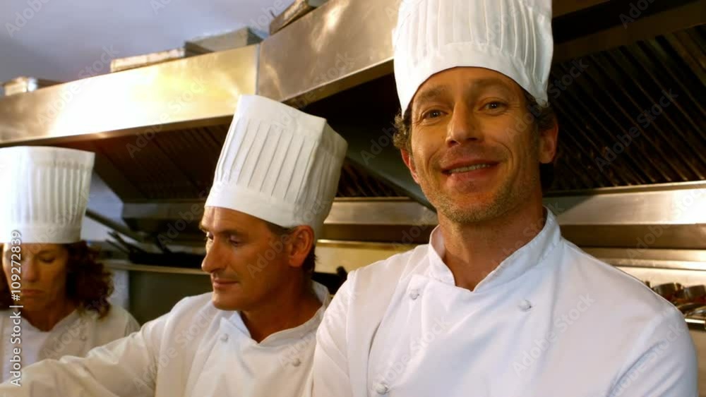 Smiling chef with arms crossed