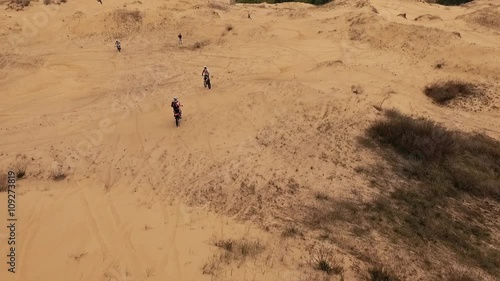 Motor racers in Oleshky sands. Ukraine. Slow motion photo