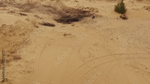 Motor racers in Oleshky sands. Ukraine. Slow motion photo