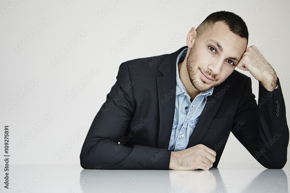 Young man looking at camera