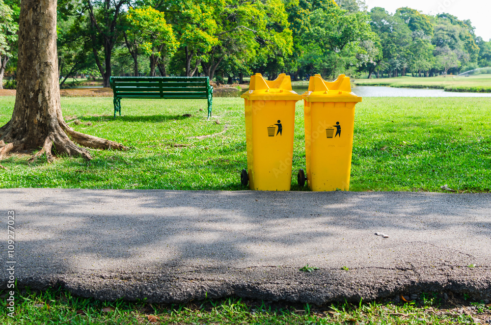 yellow bin in the park