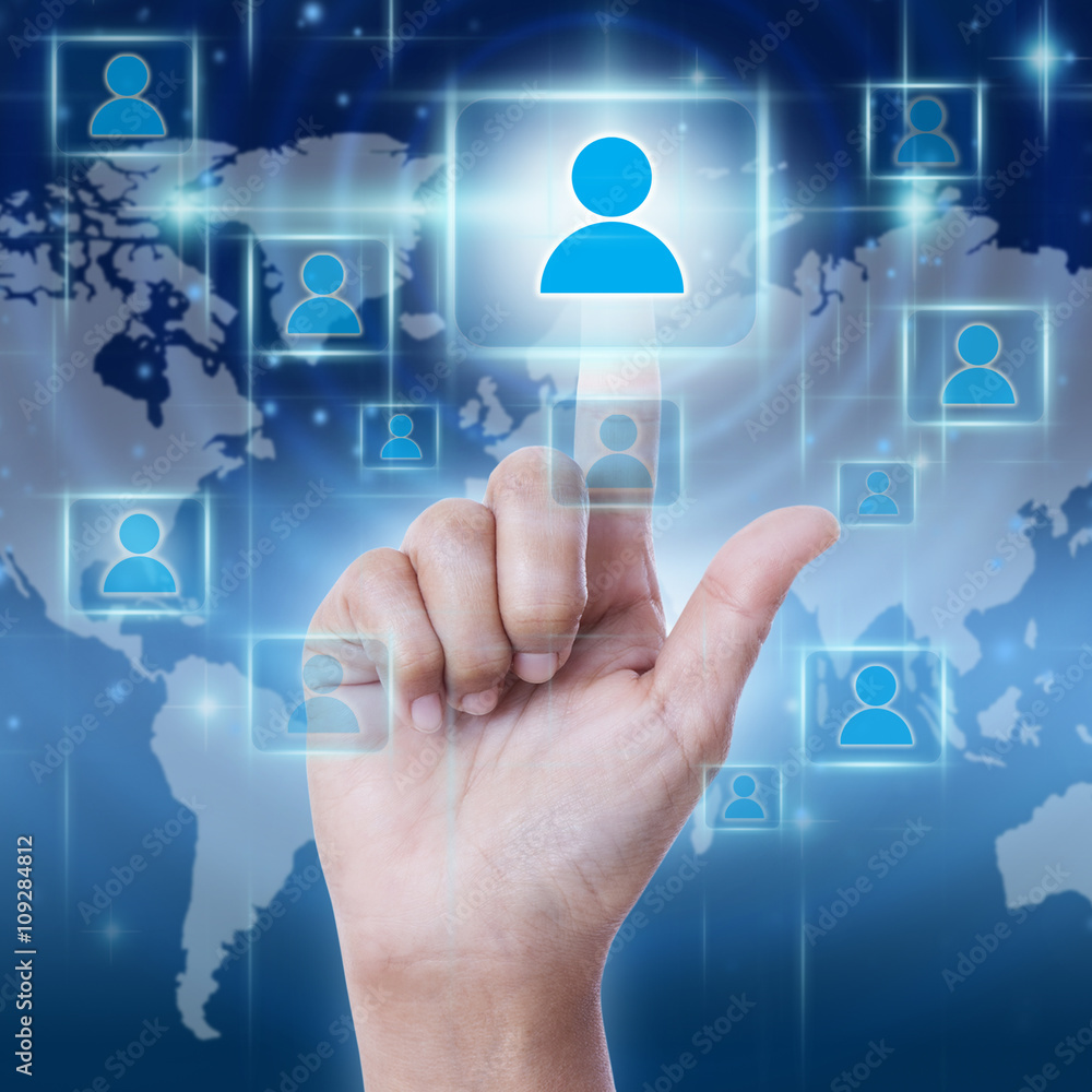 Hand pressing Social Network icon on virtual screen. Hand pressing Social Network icon on virtual screen.