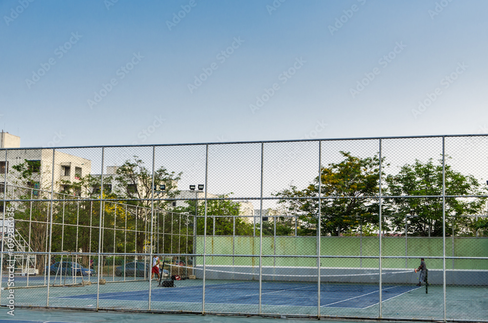Fototapeta premium Tennis cort in park,excercise and relax,morning light