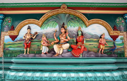 The sculptures of Shiva, Parvati and Ganesha in Hindu temple. Kuala Lupmur, Malaysia