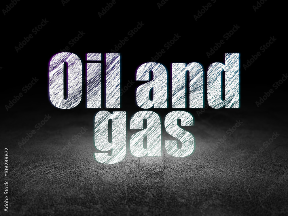 Naklejka premium Industry concept: Oil and Gas in grunge dark room