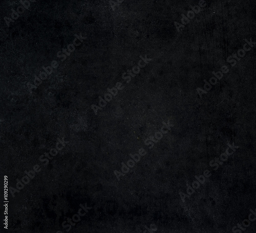 Dark black grunge backdrop. Surface, background and wallpaper.