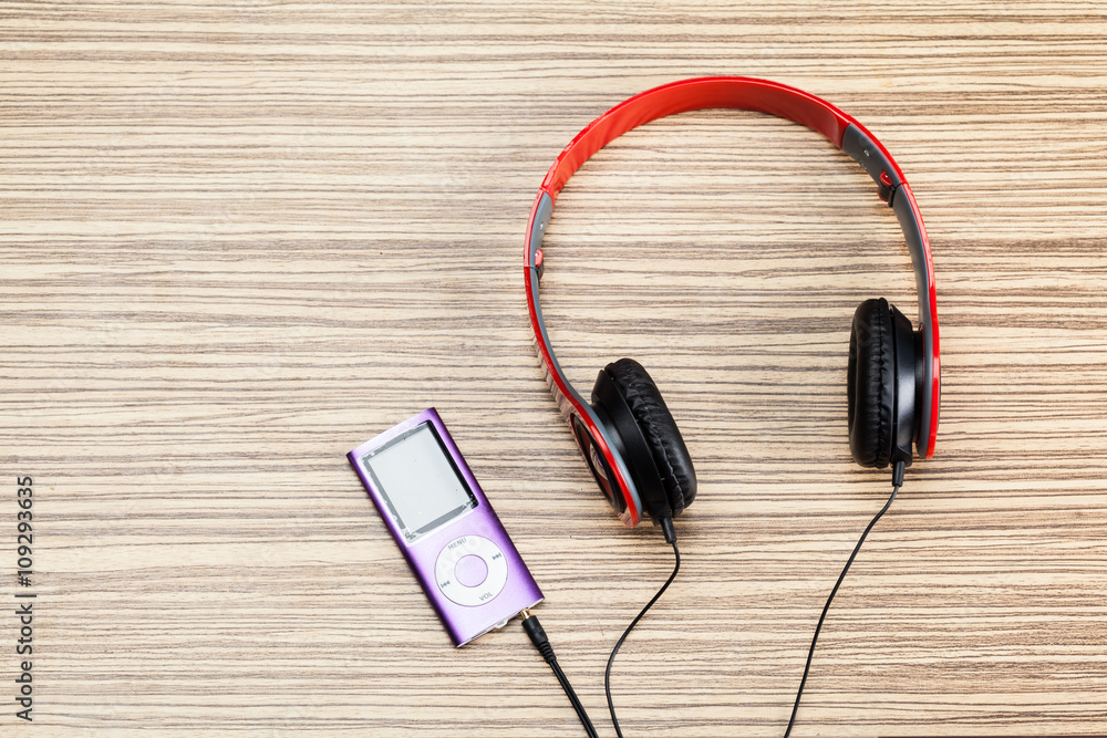 headphones on wooden background headphones on wooden background