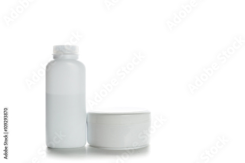 Cosmetic containers isolated on white