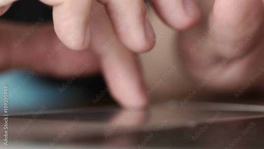 man's fingers touching laptop touchpad. close-up man's fingers touching laptop touchpad. close-up